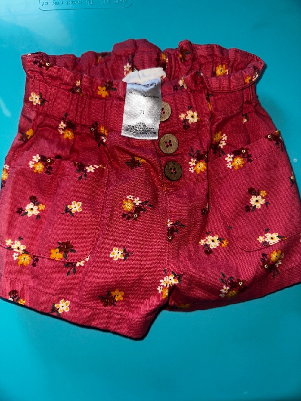 babys red flower shorts